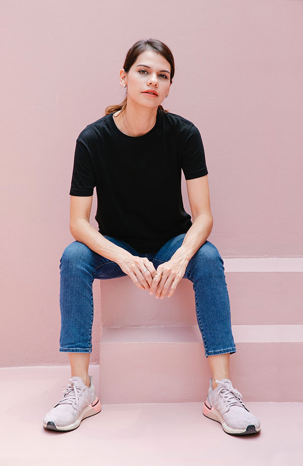 woman-casual-black-shirt-sitting-steps